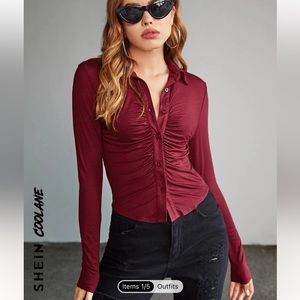 Ruched burgundy button front blouse.